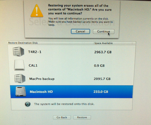 "Macintosh HD" selected as the target disk to process restore.