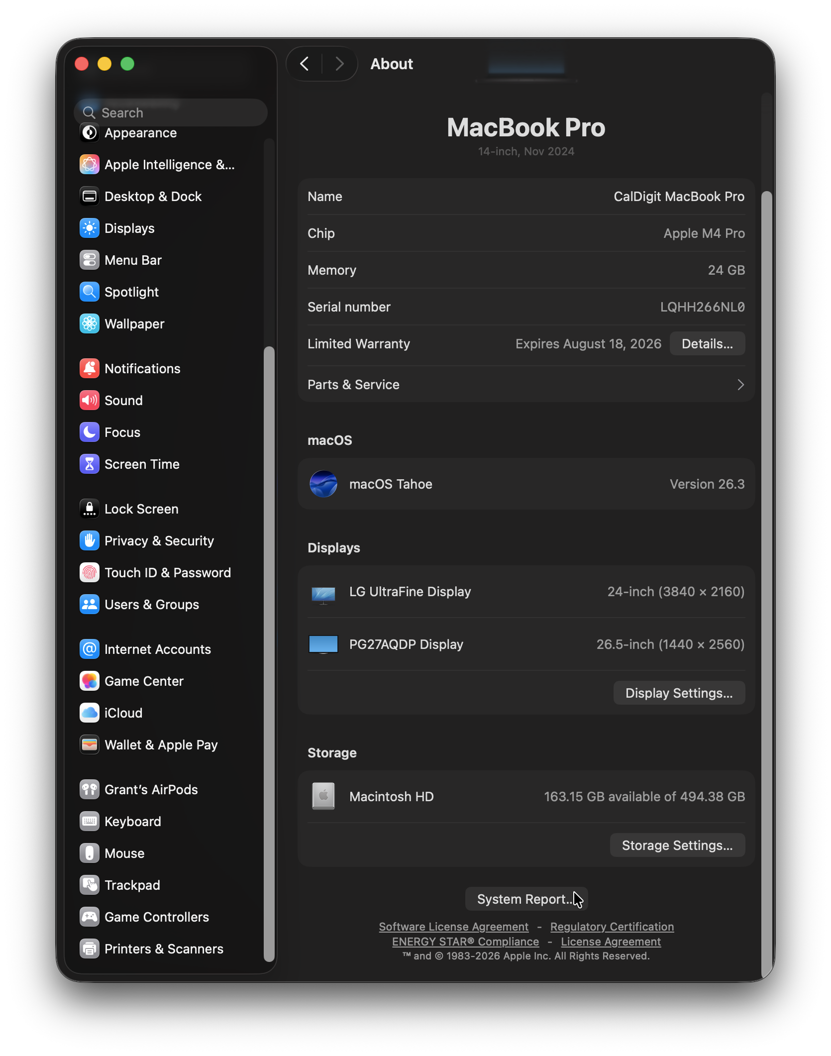 Screenshot of the System Settings application with the About tab open. Mouse pointer is hovering over System Report button at the bottom of the window.