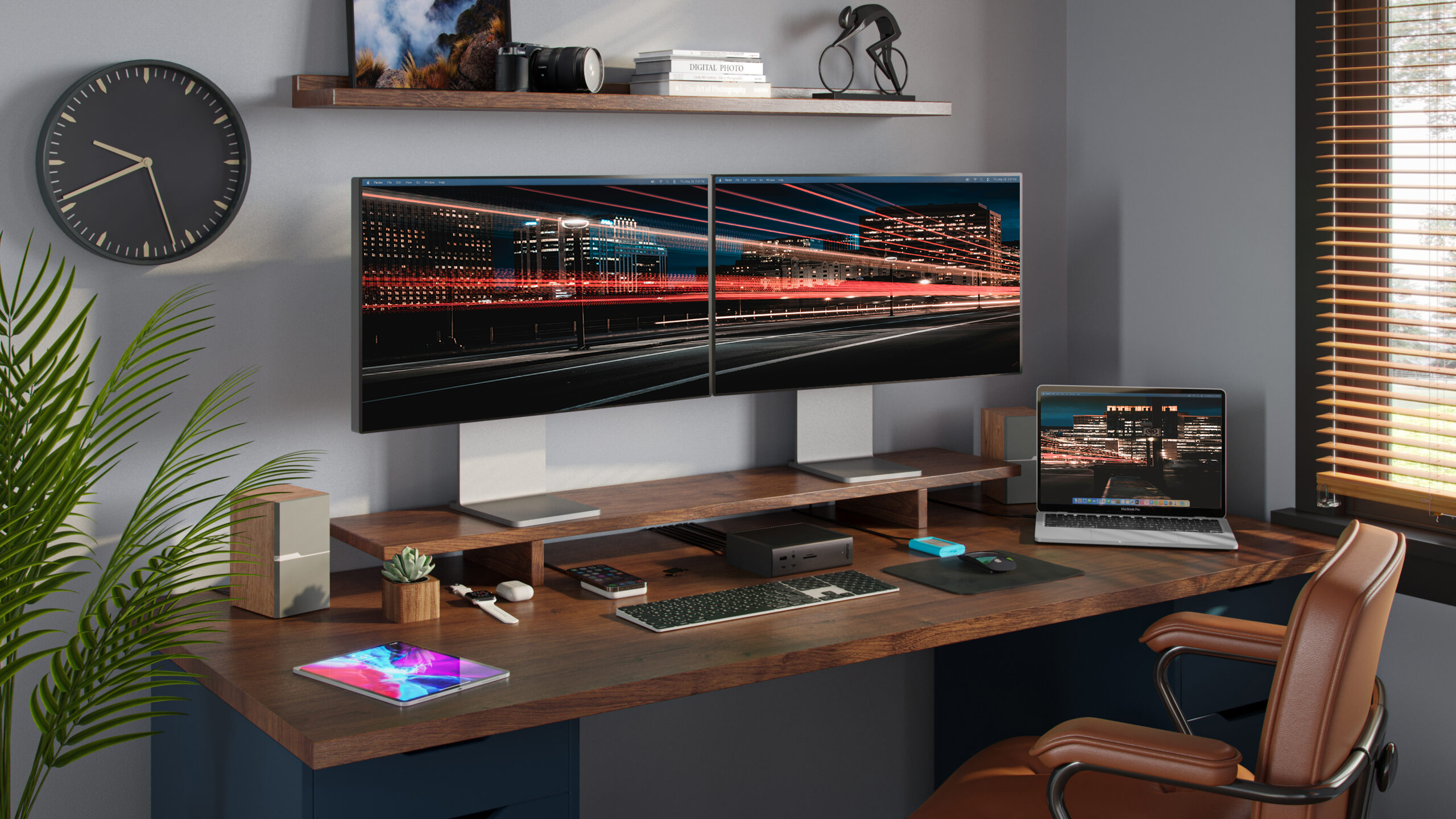 An image of a desk with the CalDigit TS5 Plus connected to a MacBook Pro and dual displays.